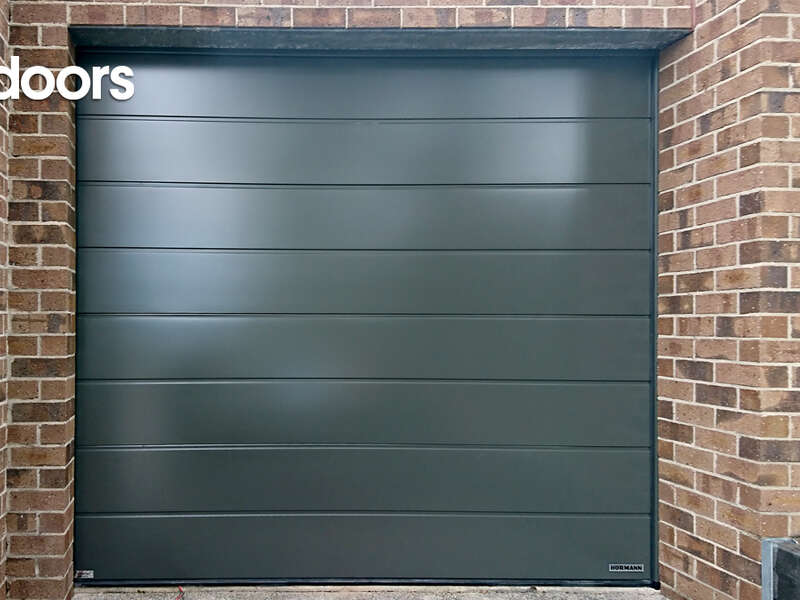 4Ddoors Sectional Garage Door - M-Ribbed Profile in colour 'Umbra Grey', with a Silkgrain Finish