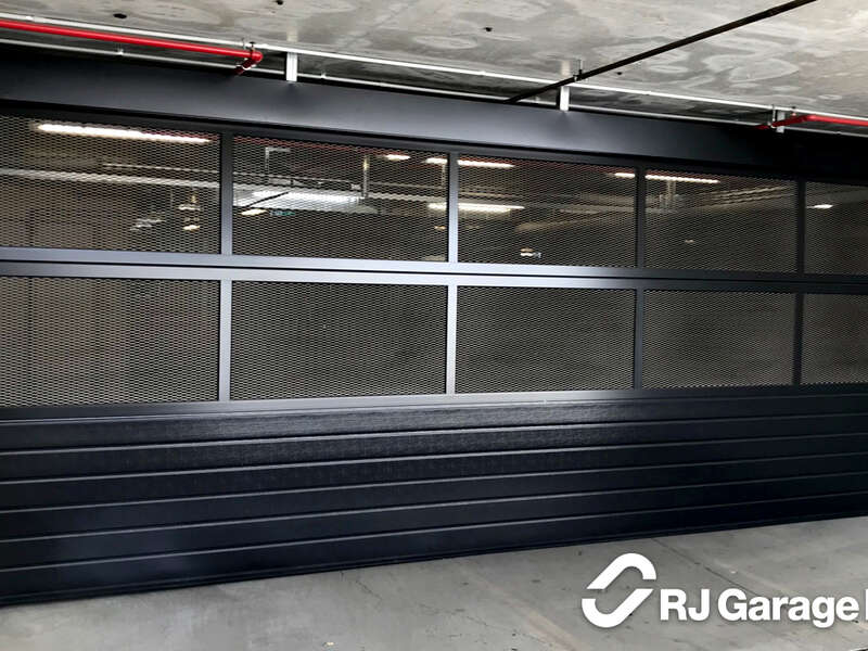 RJ Garage Doors installation of APU Hörmann Industrial Sectional Garage Door - With Expanded Mesh Panels
